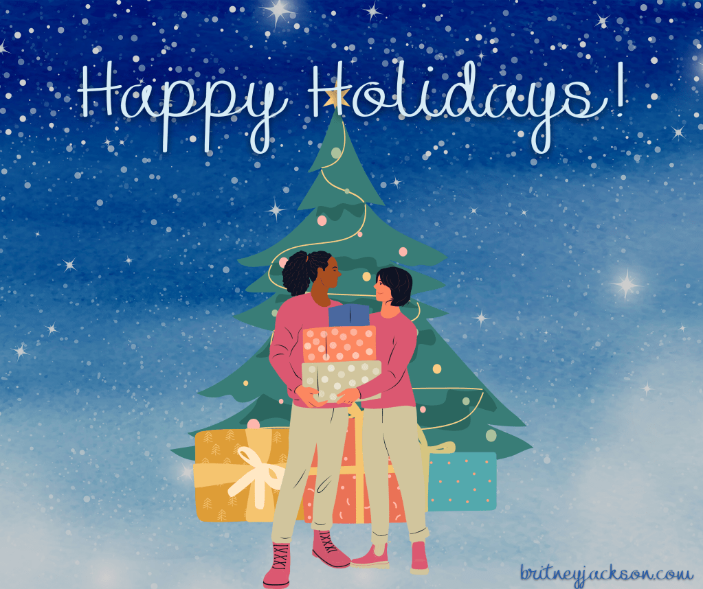 Sapphic couple exchanging gifts in front of a Christmas tree.